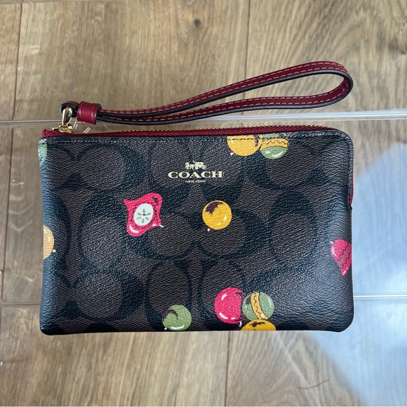 Coach Handbags - NWOT Coach Christmas Signature Wristlet